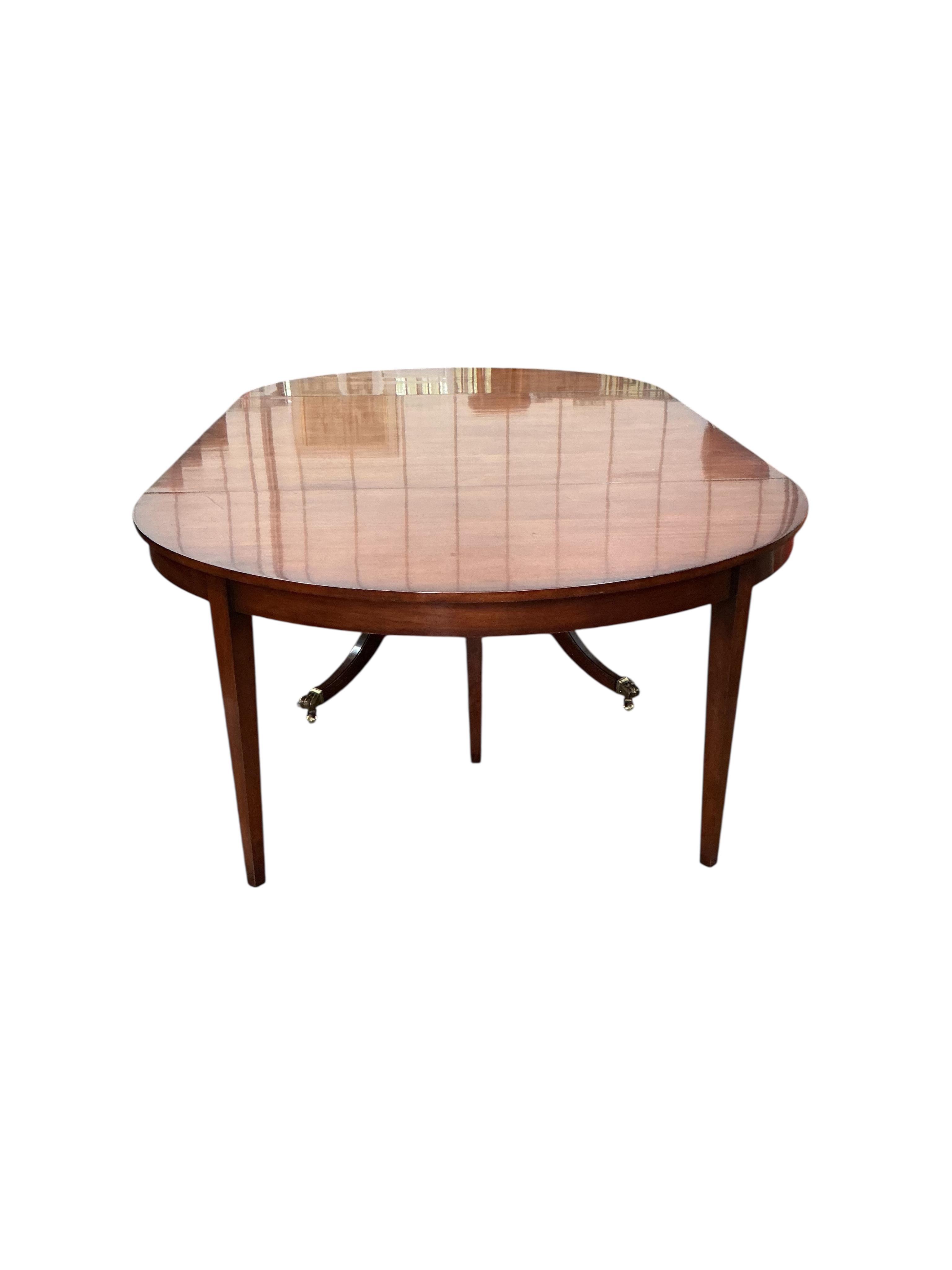 A reproduction George III style mahogany D end dining table, width 305cm extended, depth 145cm, height 74cm